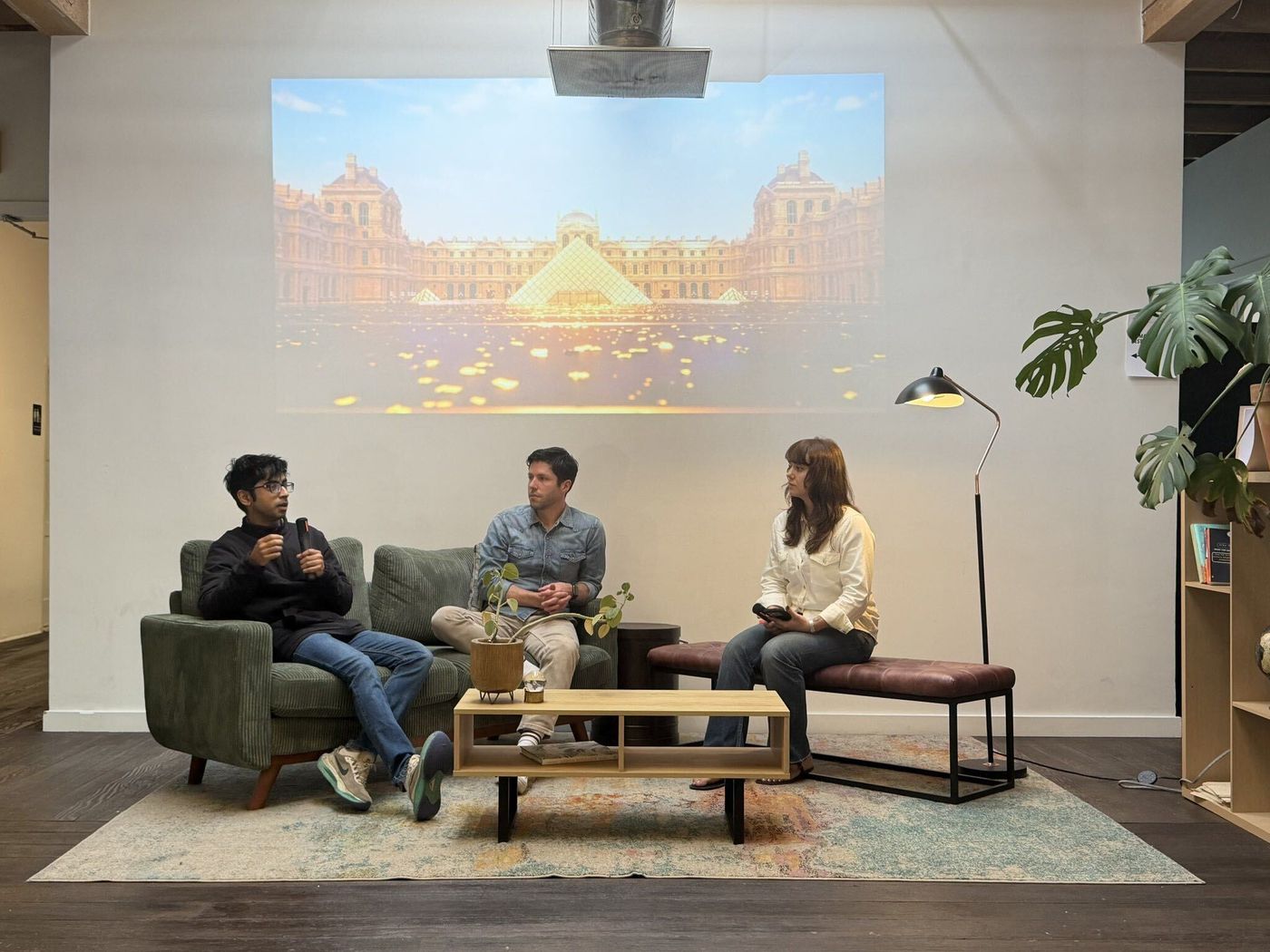 Harsh Sharma speaking on a panel at the VLGE AI Open World Hackathon in San Francisco, July 2026